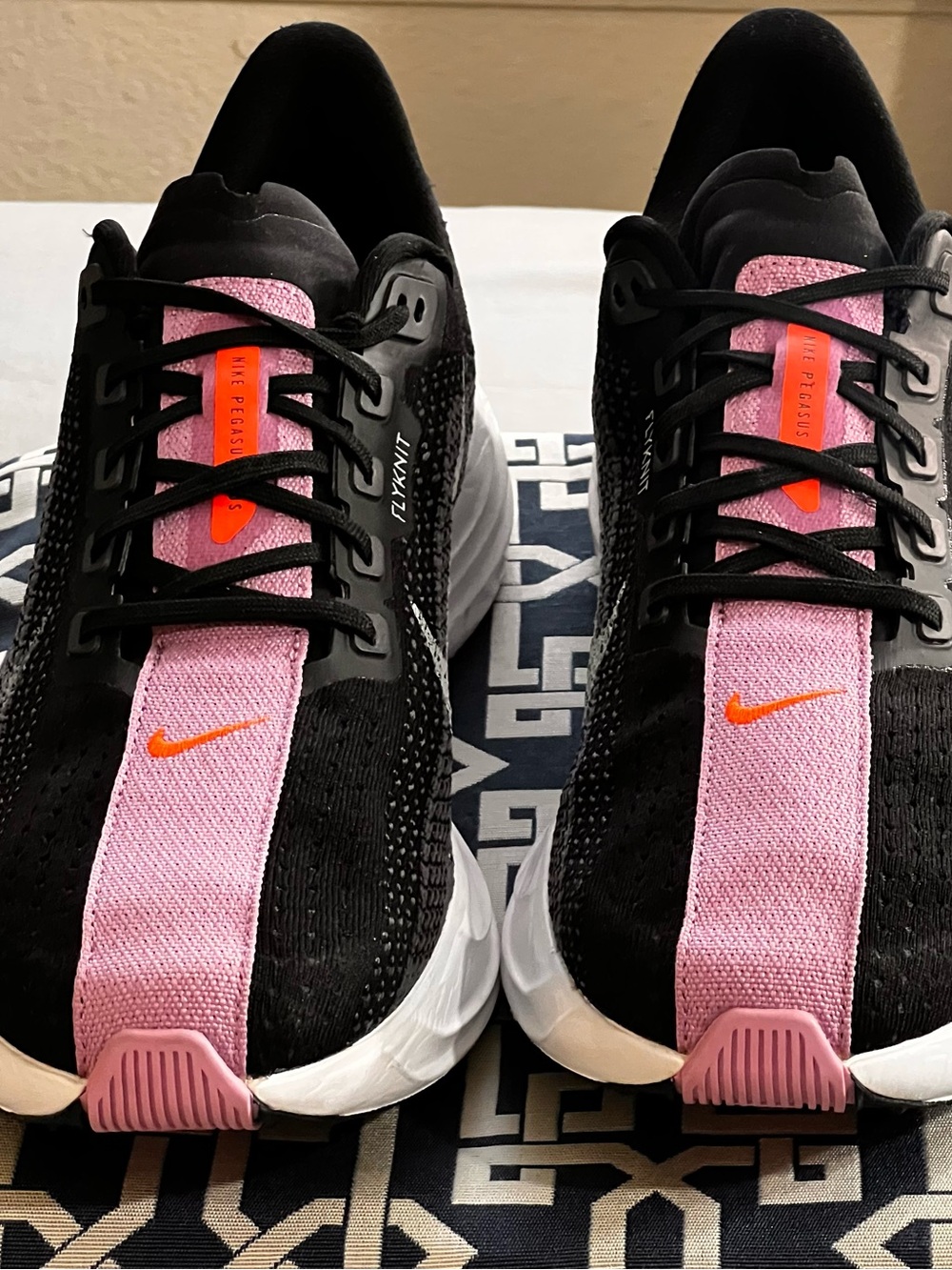 Nike Women’s Black & Pink Athletic Shoes with Orange Swoosh